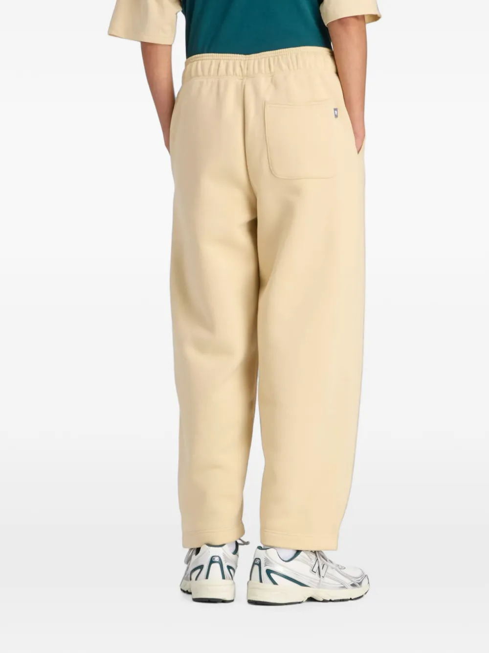 New Balance Trackside fleece broek Beige