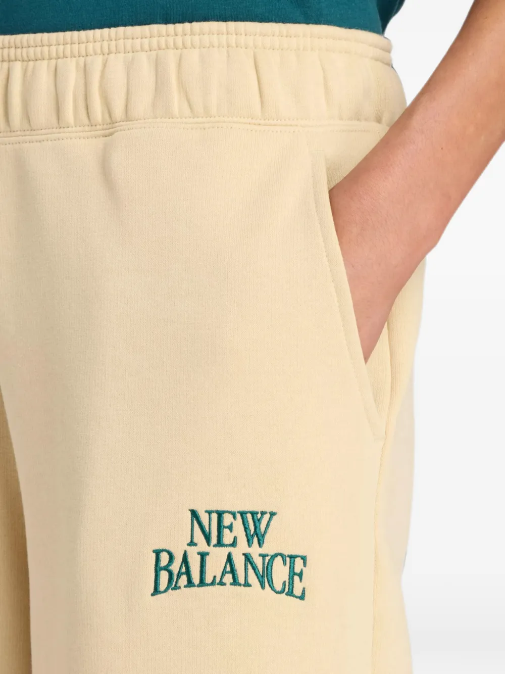 New Balance Trackside fleece broek Beige