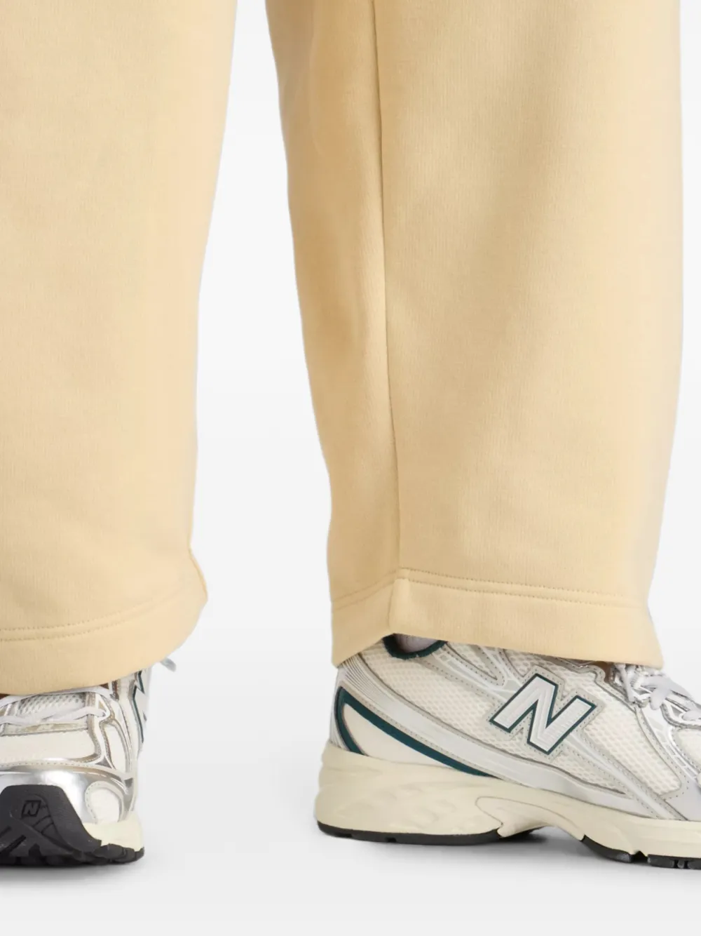 New Balance Trackside fleece broek Beige