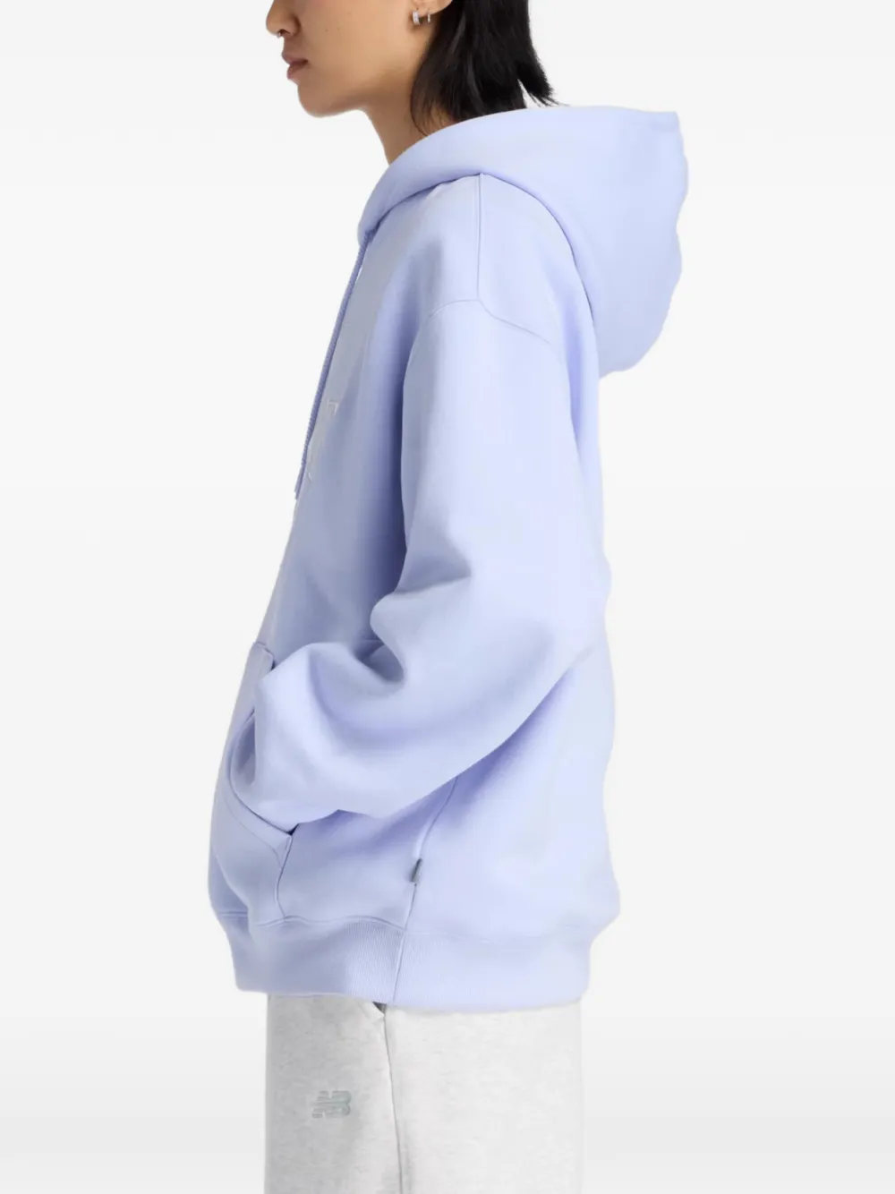 New Balance Trackside fleece hoodie Paars