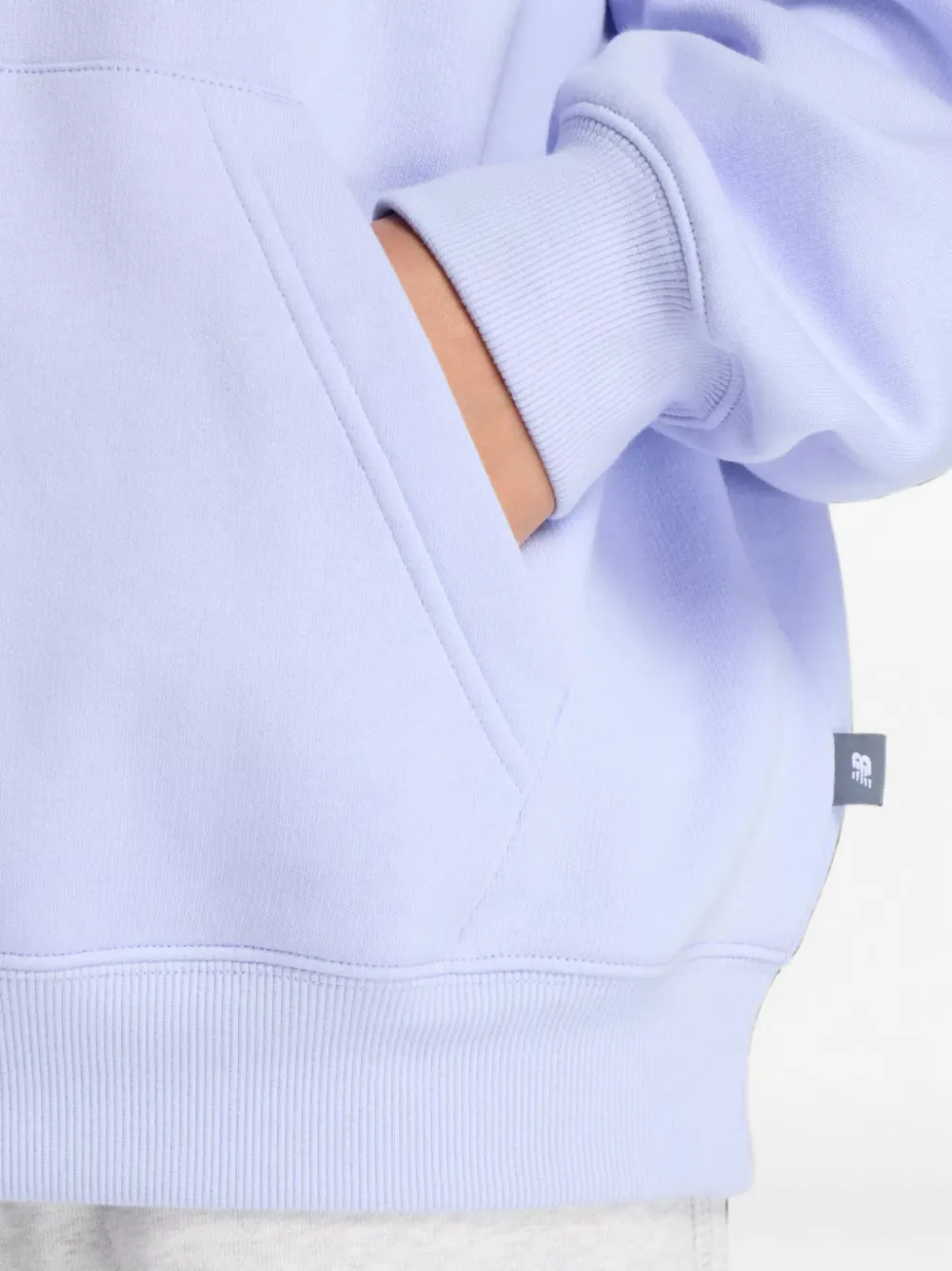 New Balance Trackside fleece hoodie Paars