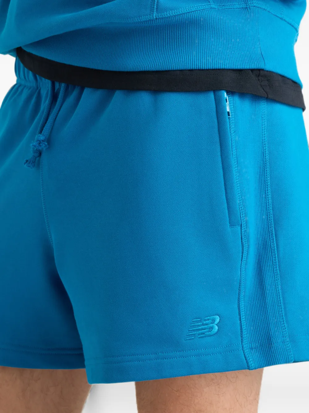 New Balance Athletics badstof shorts Blauw