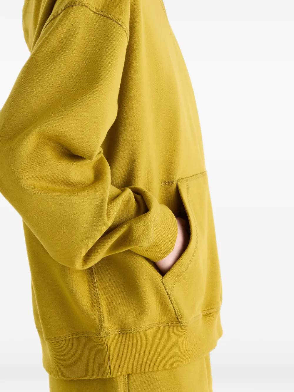 New Balance Athletics sweatstof hoodie Geel