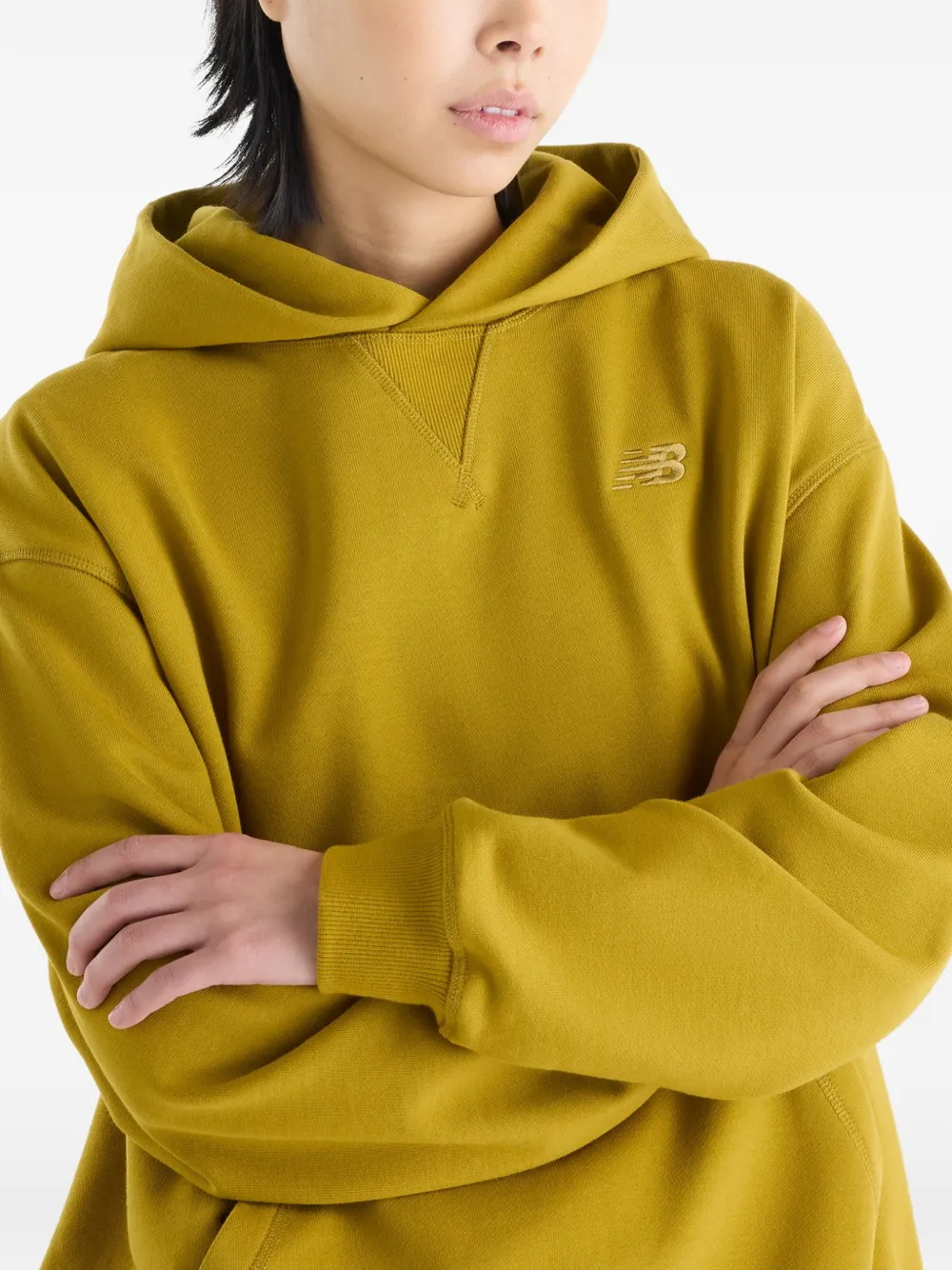 New Balance Athletics sweatstof hoodie Geel