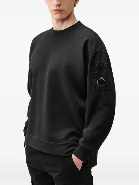 C.P. Company 렌즈 디테일 스웨트셔츠