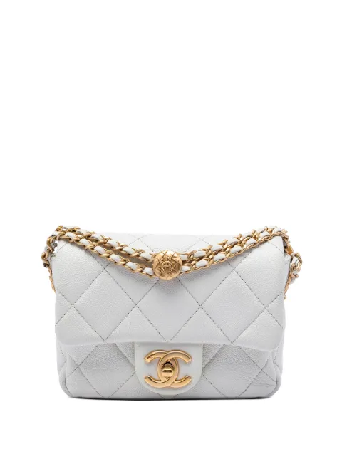 CHANEL Pre-Owned 2021-2026 Mini Quilted Caviar Twist Your Buttons Flap crossbody bag