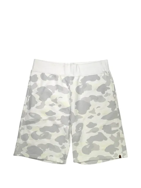 A BATHING APE® glow-in-the-dark camo-print shorts