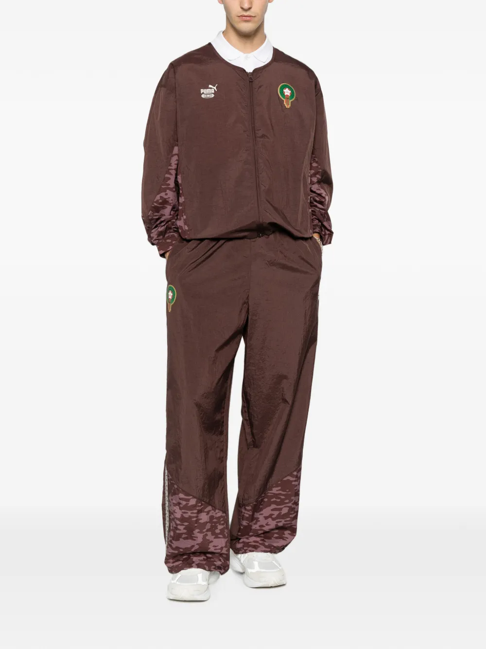 PUMA King trainingsbroek met logo-print Bruin
