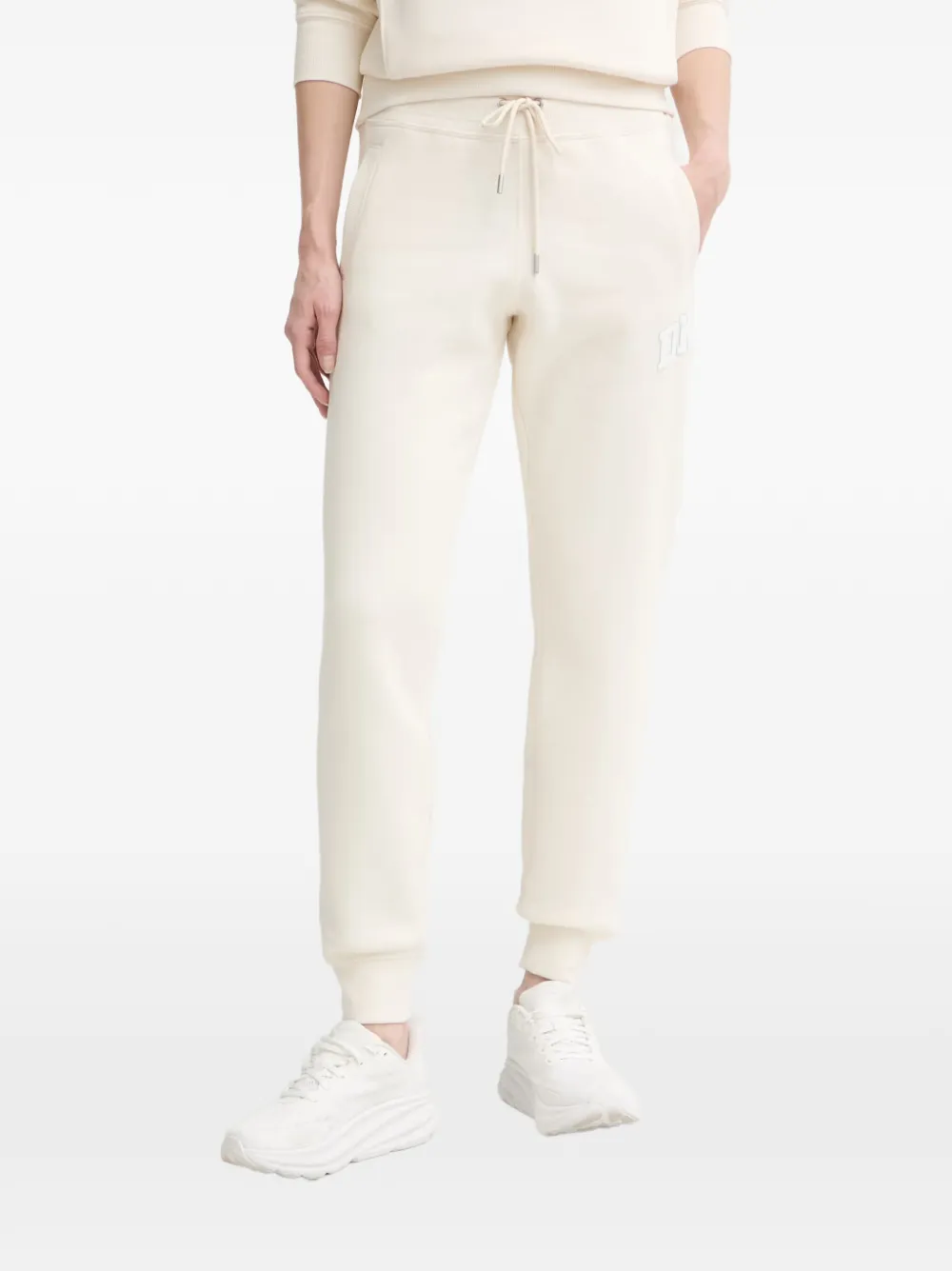 DKNY logo-patch track pants - Toni neutri