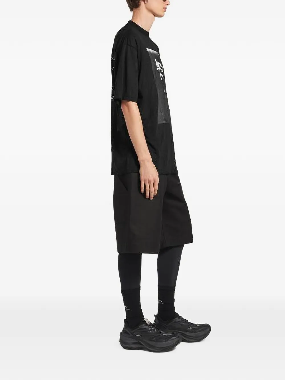 Balenciaga T-shirt met bloemenprint en tekst Zwart