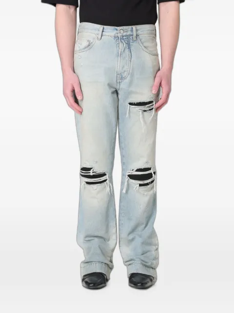 AMIRI distressed-effect logo-patch jeans