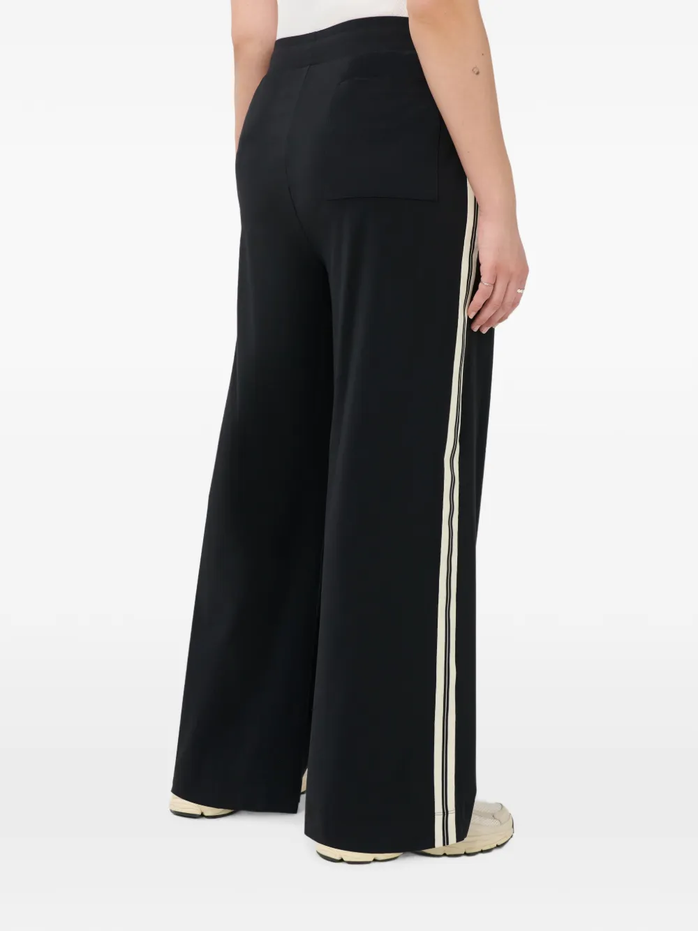 Sweaty Betty Explorer trainingsbroek met zijstreep en wijde pijpen Zwart