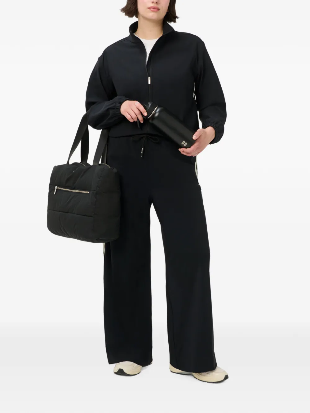 Sweaty Betty Explorer trainingsbroek met zijstreep en wijde pijpen Zwart