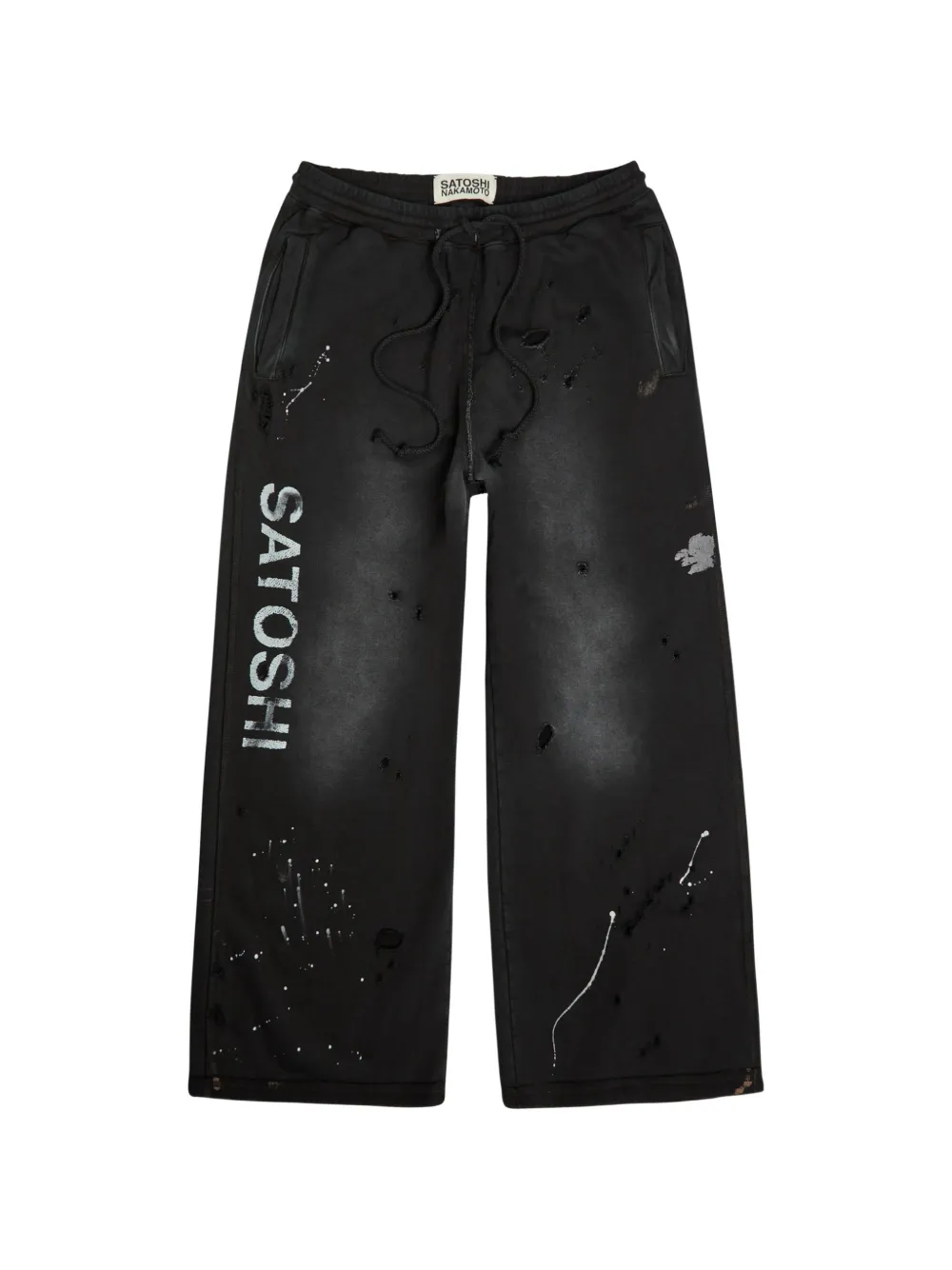 SATOSHI NAKAMOTO distressed paint-splatter track pants - Nero