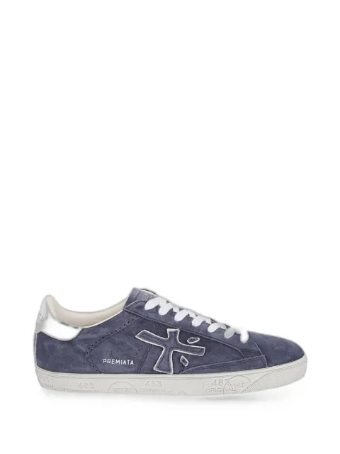 Premiata tenis con parche del logo
