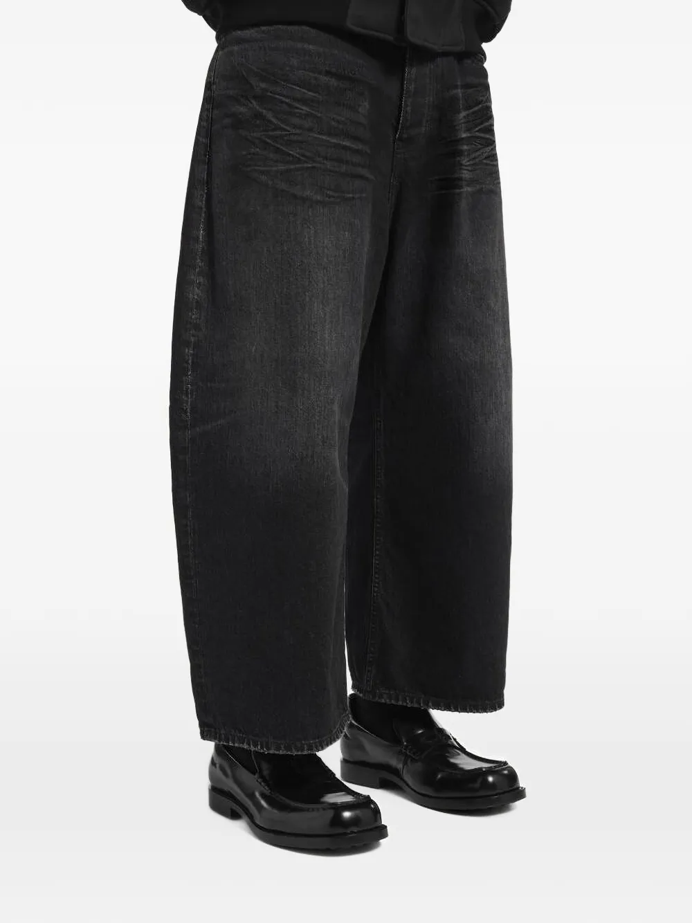 Balenciaga Gewelfde jeans met vervaagd effect Zwart
