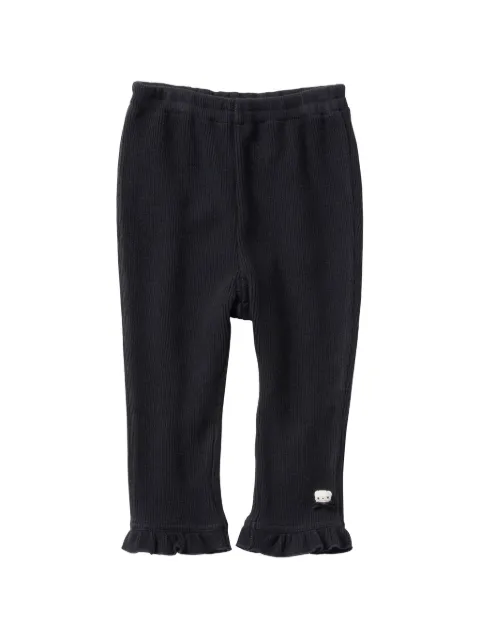 familiar pantalones de canalé con ribete de volantes