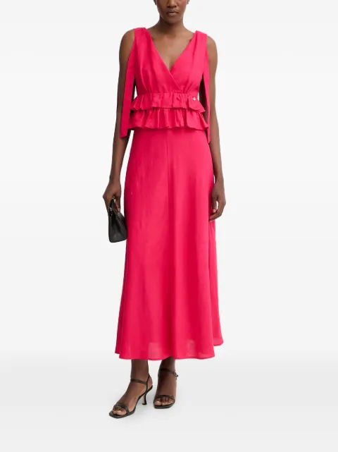 Pedro Del Hierro vestido largo con ribete de volantes y lazo en el hombro