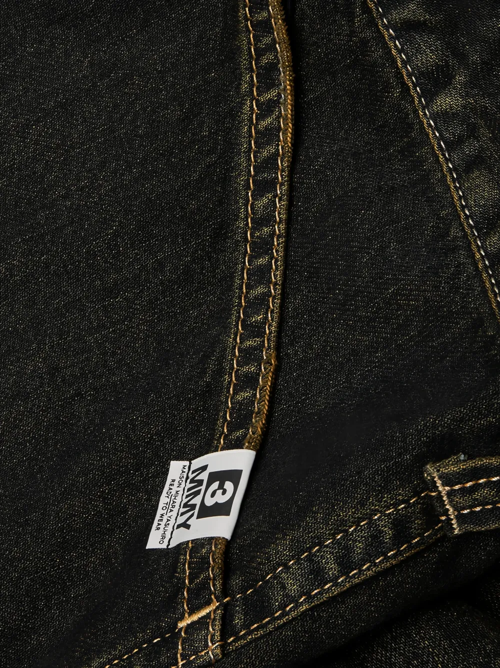 Maison MIHARA YASUHIRO Ruimvallende jeans met gelaagd design Blauw