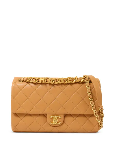 CHANEL Pre-Owned bolso de hombro acolchado con logo CC