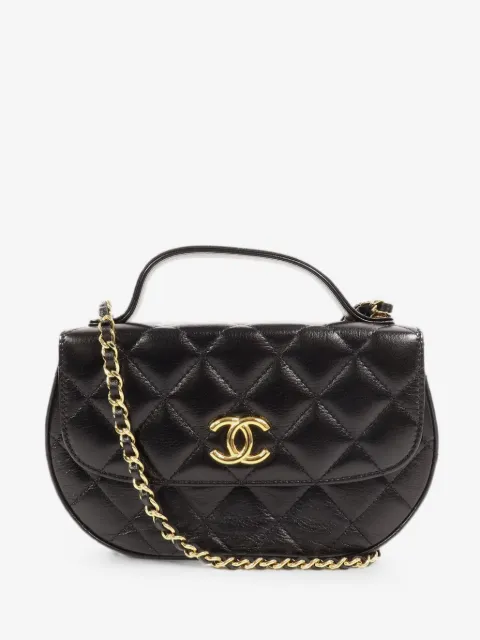 CHANEL Pre-Owned bolsa de hombro con cierre giratorio y logo CC capitonado