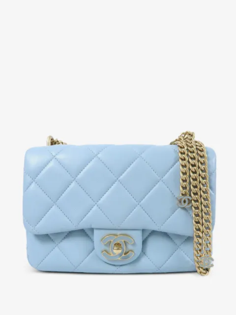 CHANEL Pre-Owned bolsa de hombro con cierre giratorio y logo CC capitonado