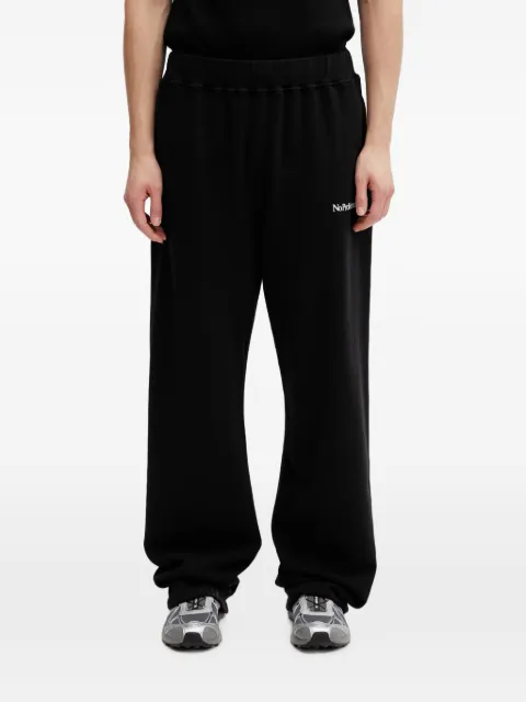 NO PROBLEMO logo-print track oversized fit pants