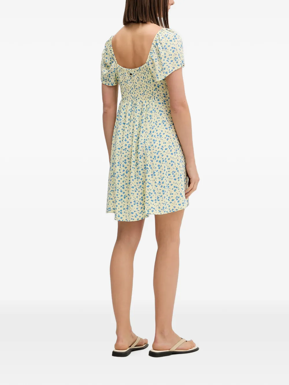Rip Curl Mini-jurk met bloemen-print en striksluiting aan de voorkant Geel