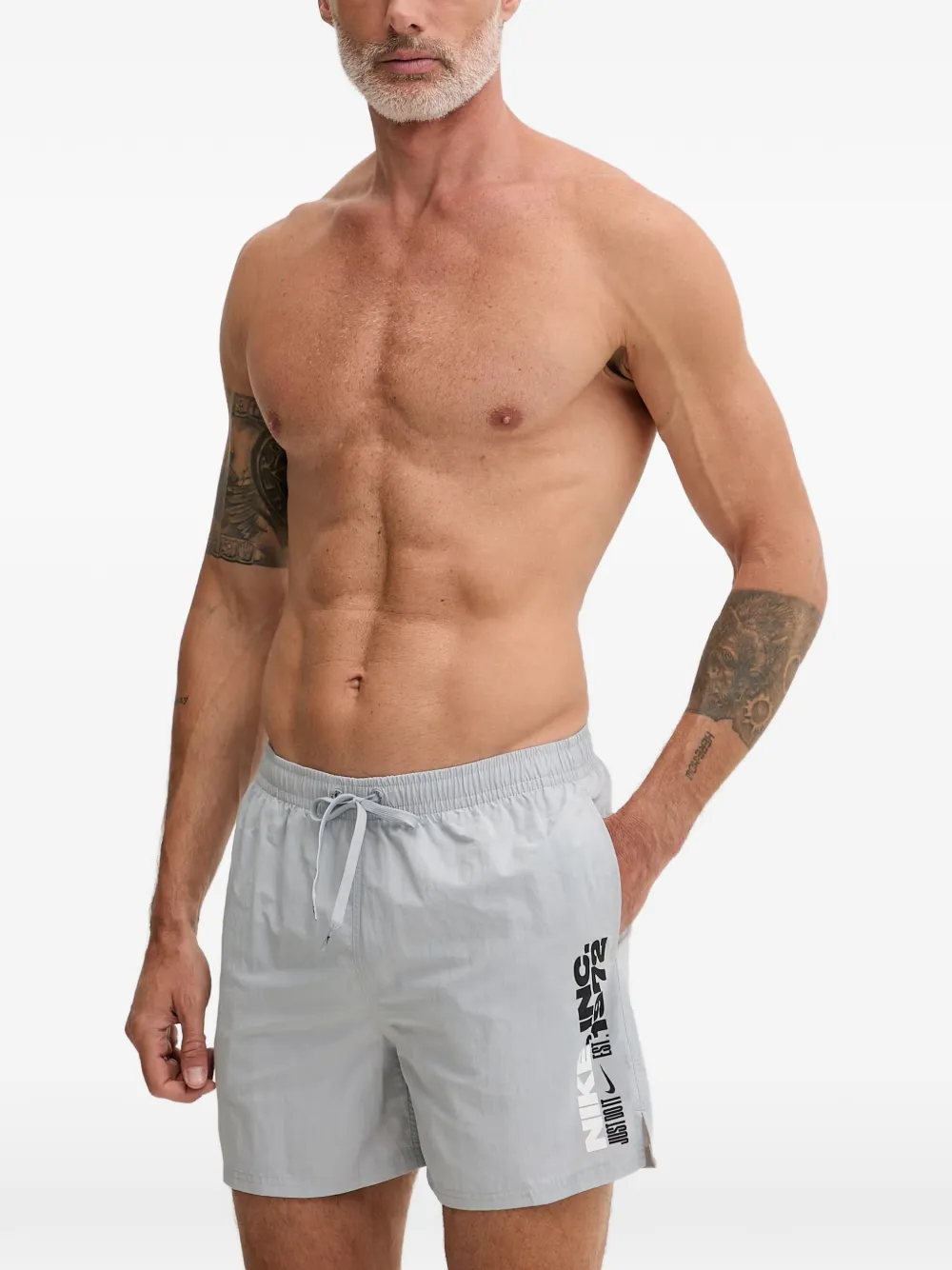Nike logo-print drawstring swim shorts - Grigio