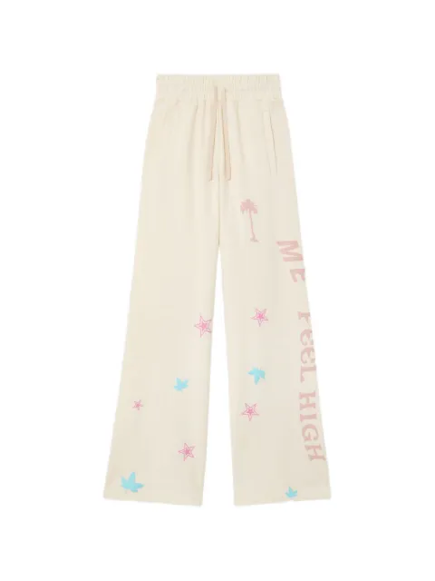 Palm Angels pants con estampado gráfico