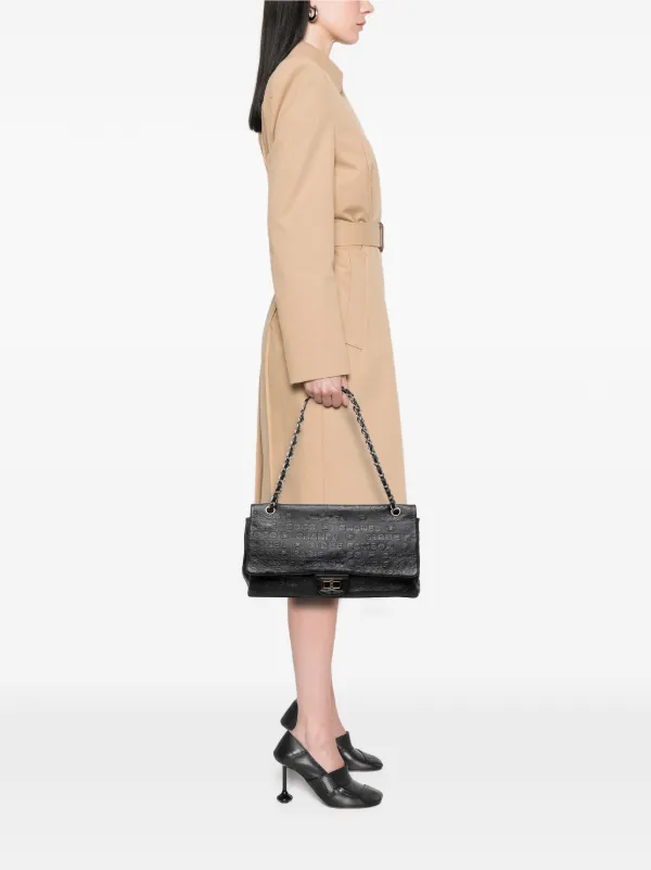 CHANEL Pre-Owned 2008-2009 マキシ エンボス カーフスキン 31 リュ 