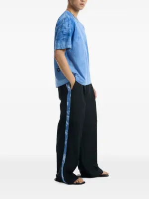 Stockholm Surfboard Club Pants for Men - Shop Now on FARFETCH