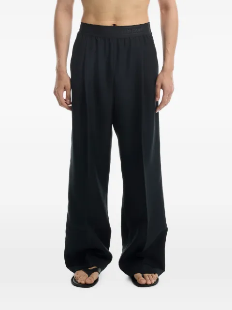 Stockholm Surfboard Club side-stripe wide-leg trousers