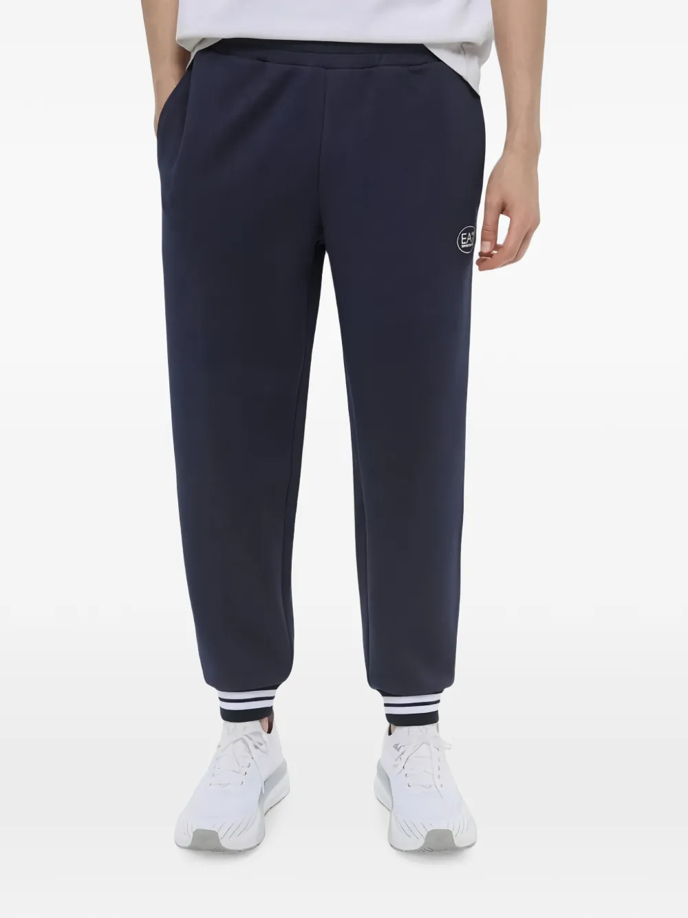 Ea7 Emporio Armani Trainingsbroek met gestreepte manchetten en logo-print Blauw
