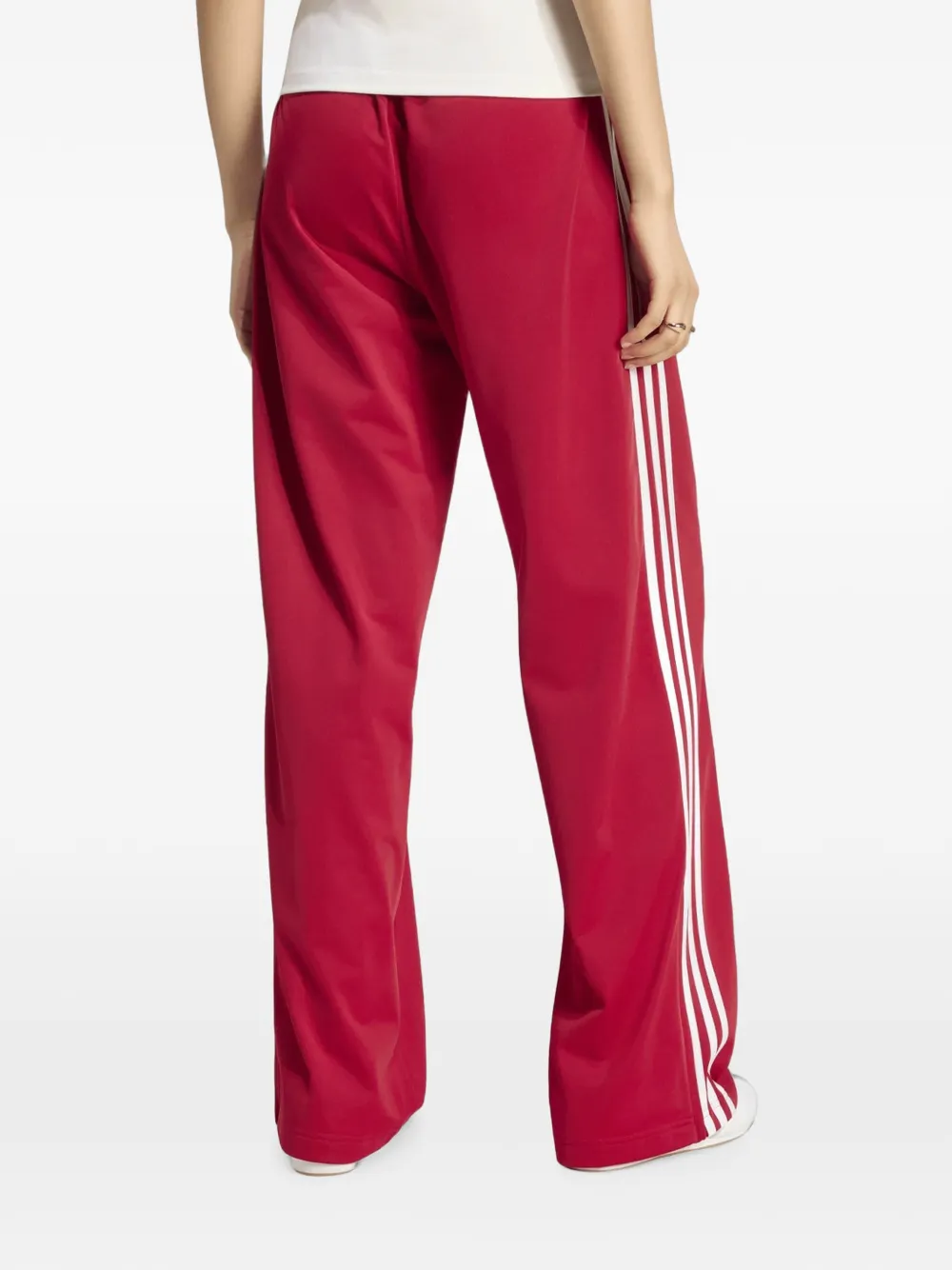 adidas Firebird ruimvallende trainingsbroek Rood