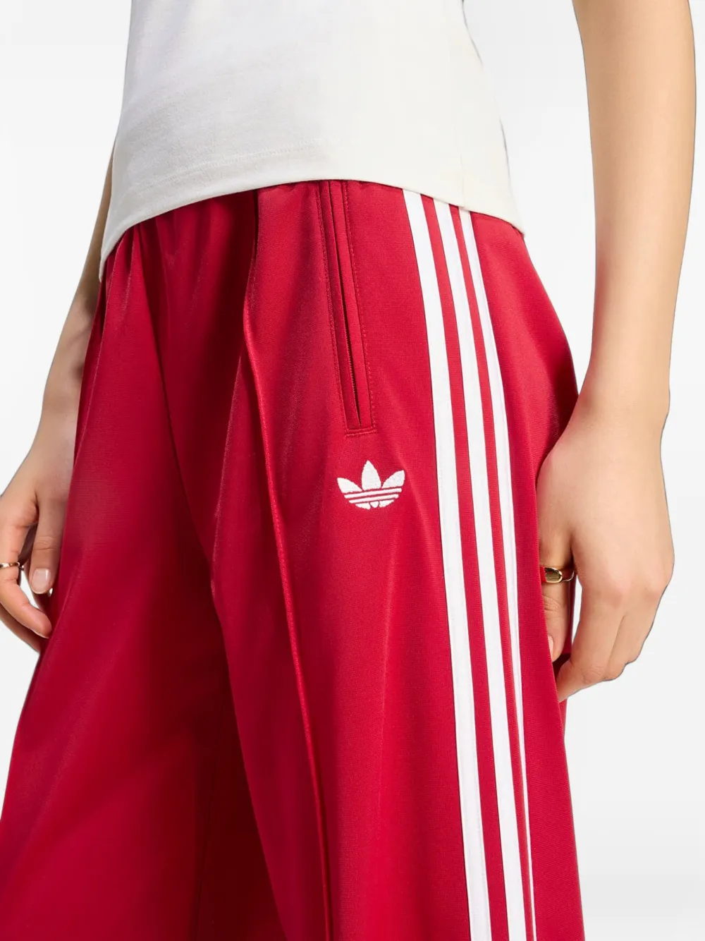 adidas Firebird ruimvallende trainingsbroek Rood