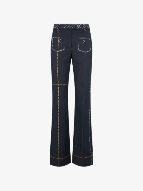 Moschino jeans acampanados con costuras en contraste