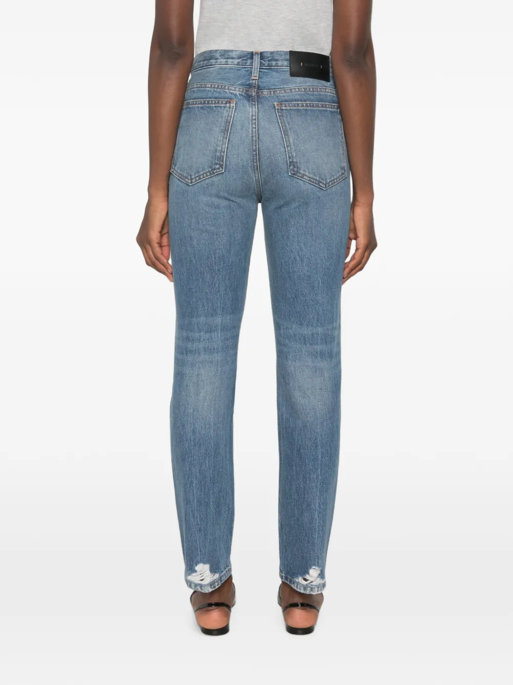 KHAITE Finley gerafelde jeans met vervaagd effect Blauw
