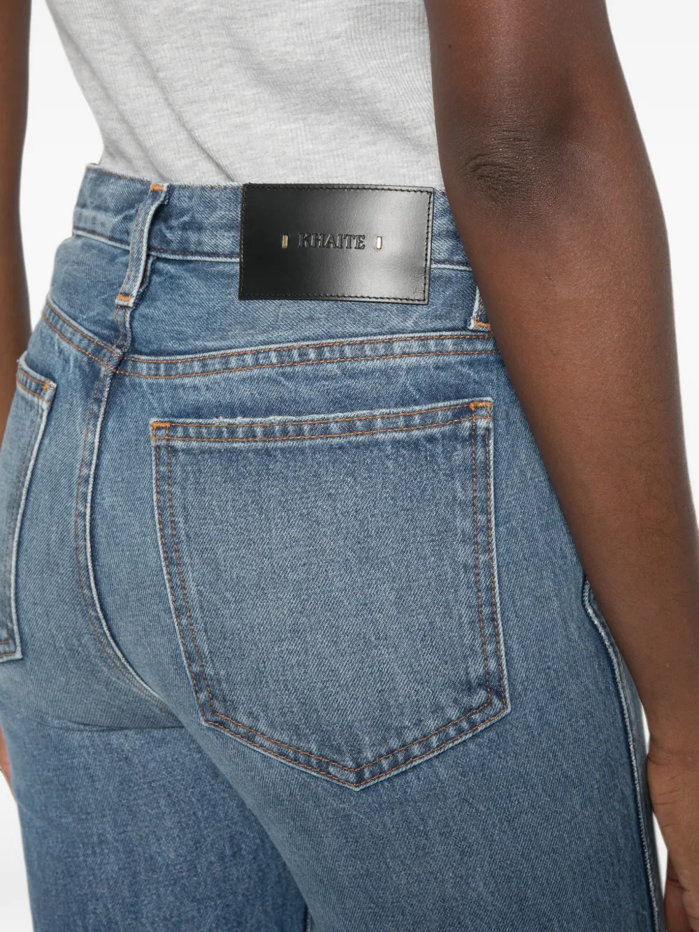 KHAITE Finley gerafelde jeans met vervaagd effect Blauw