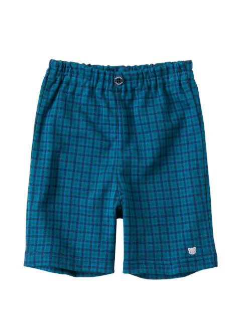 familiar check-pattern trousers