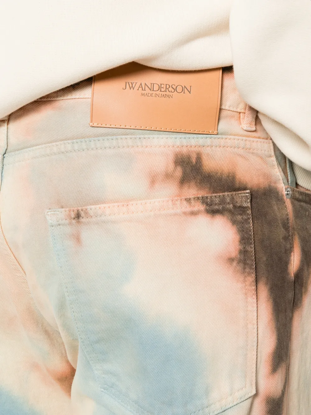 JW Anderson Straight denim jeans met gebleekt effect Oranje