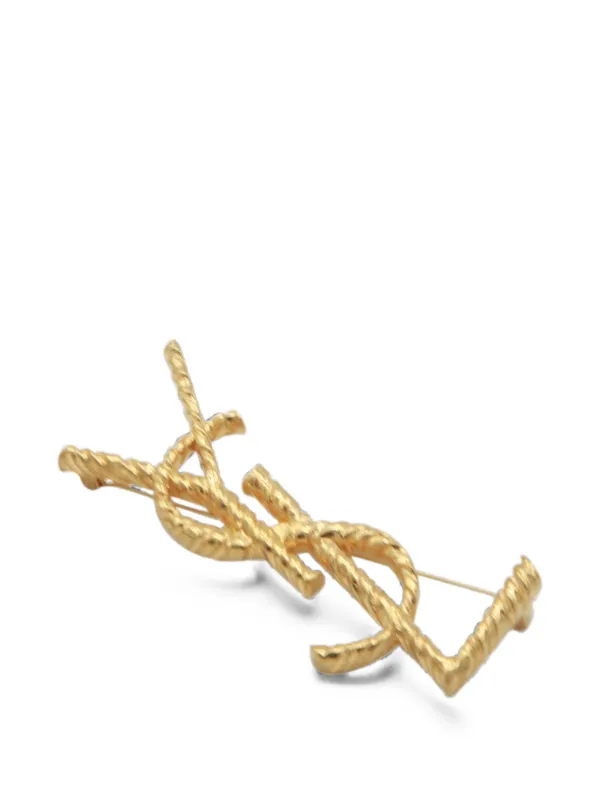  イヴサンローラン カサンドラ ブローチ ゴールド Saint Laurent カッサンドラ ブローチ | ゴールドトーン | FARFETCH JP