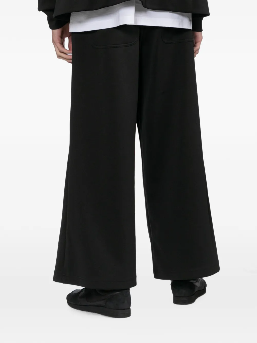Black Comme Des Garçons wide-leg track pants Zwart