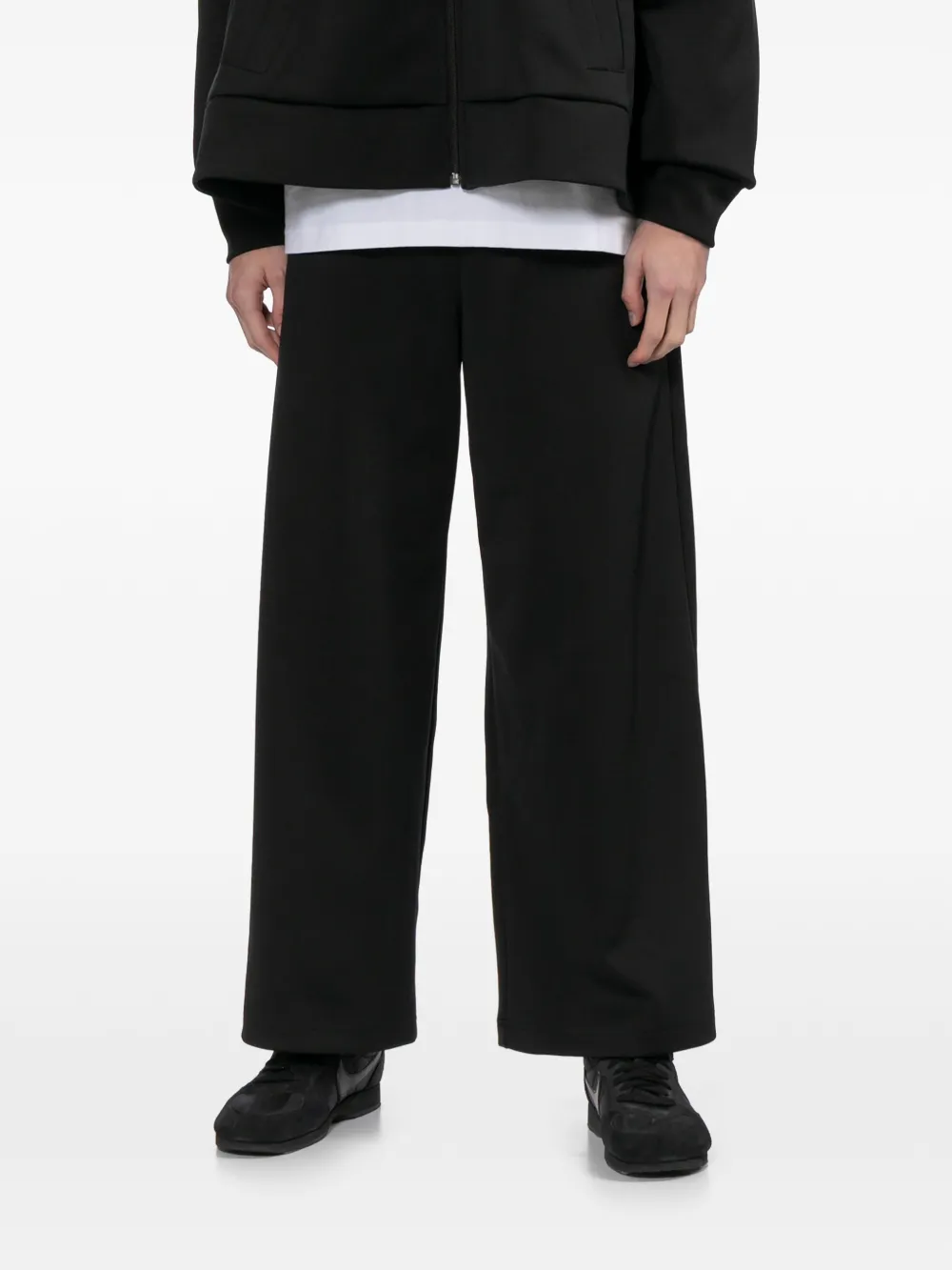 Black Comme Des Garçons wide-leg track pants Zwart