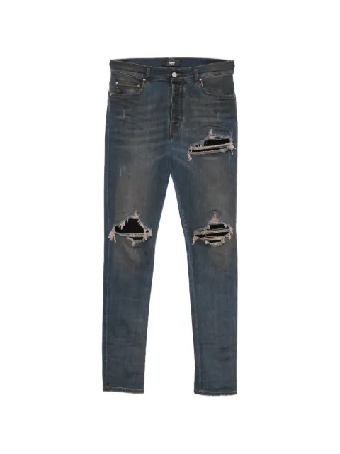 AMIRI Calça jeans slim Ultrasuede MX1 com efeito destroyed