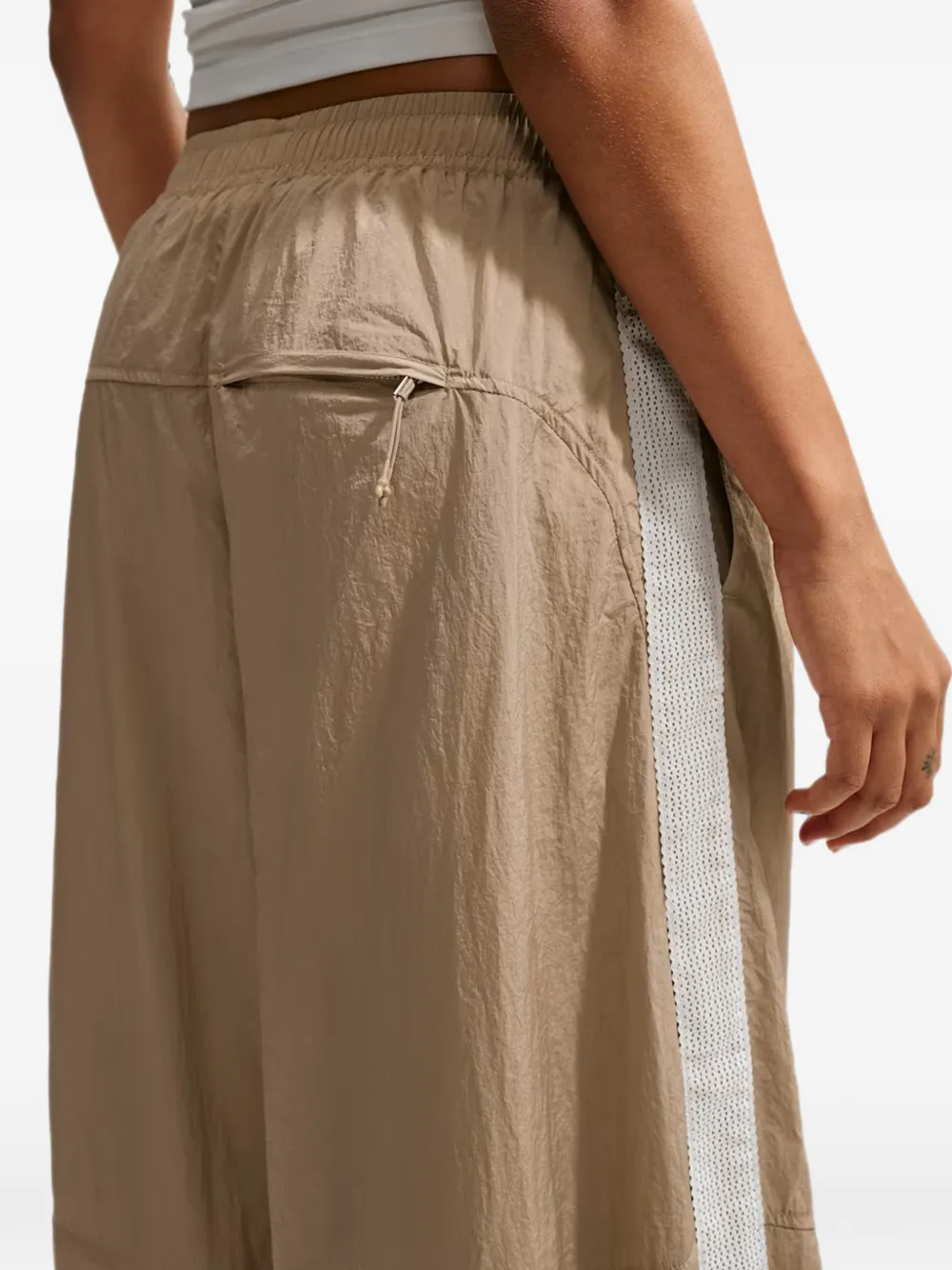 Nike mesh-panel track pants Beige