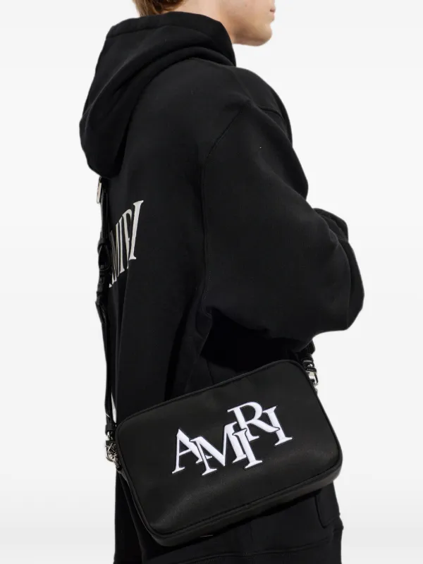 AMIRI Staggered logo-embroidered Messenger Bag | Black | FARFETCH