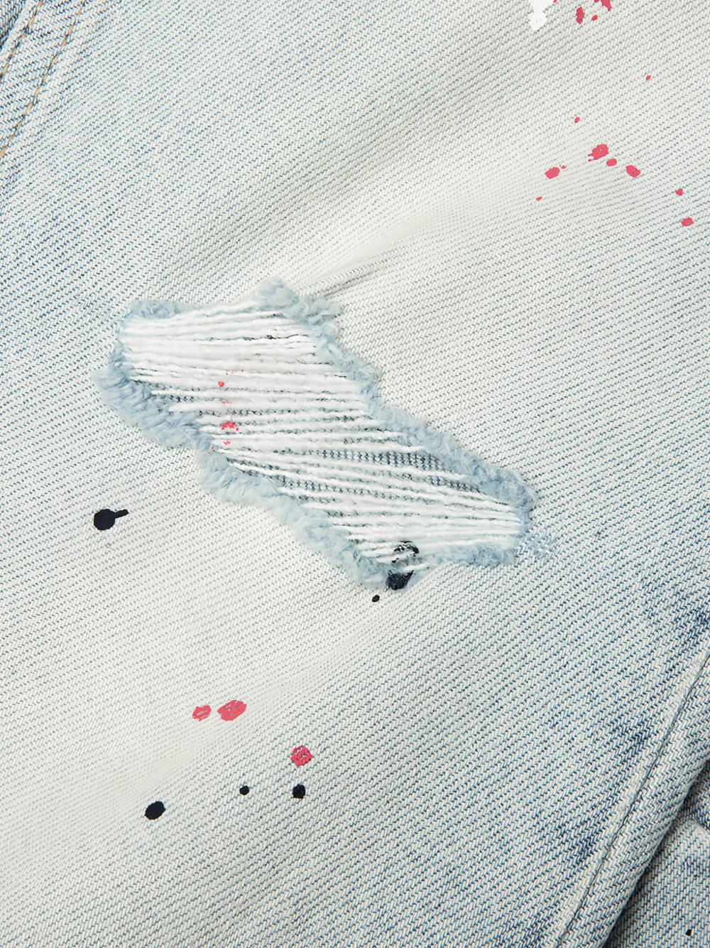 Ksubi Van Winkle Ksteller Genesis gerafelde jeans met verfspatten Blauw