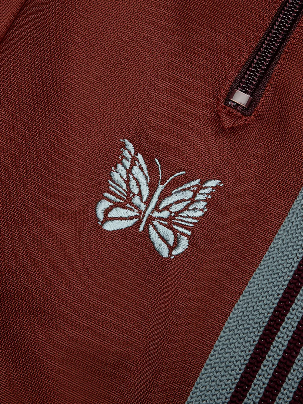 Needles Poly Smooth H.D. trainingsbroek met zijstreep Oranje