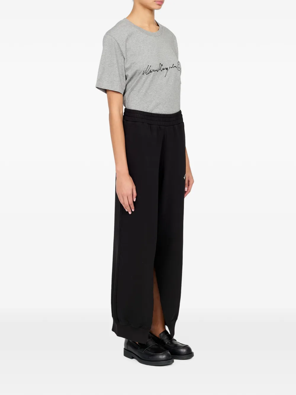 MM6 Maison Margiela Logo-print Slit-detail Track Pants in Black, view 3